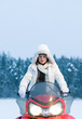 Photo: Woman and snowmobile Woman and snowmobile