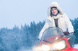 Photo: Woman and snowmobile Woman and snowmobile