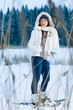 Photo: Woman and snowshoes Woman and snowshoes