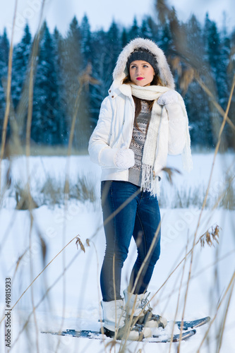 Photo: Woman and snowshoes Woman and snowshoes