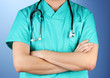 Doctor with stethoscope, on blue background