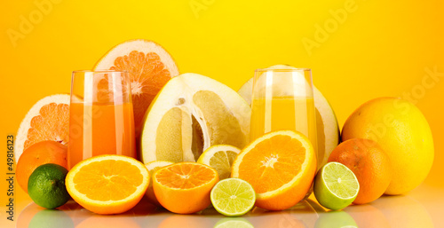 Photo: Lots ripe citrus isolated on white Lots ripe citrus isolated on white
