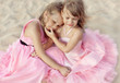 Photo: Beautiful little girl in a pink dress walking Beautiful little girl in a pink dress walking