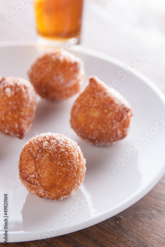 Photo: Fritter puff dusted with sugar Fritter puff dusted with sugar