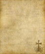 Photo: christian cross on old paper or parchment background texture christian cross on old paper or parchment background texture