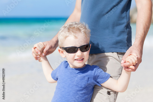 Photo: little boy at the beach little boy at the beach