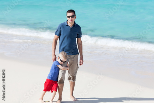 Photo: family at the beach family at the beach