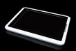 White tablet on black