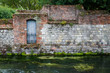 Old stone wall on river