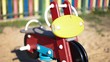 Video: Colorful play equipment in the sand on a playground Colorful play equipment in the sand on a playground