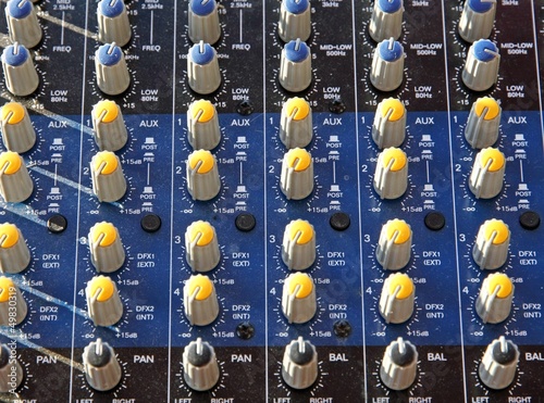 Photo: potentiometers trimmers and a mixer during a concert potentiometers trimmers and a mixer during a concert