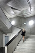 woman on the stairs in a modern technical building