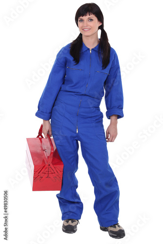 Photo: Woman with red toolbox Woman with red toolbox