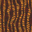 Vector: African seamless patters with tiger skin and tribal symbols African seamless patters with tiger skin and tribal symbols