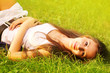 Pretty smiling girl relaxing outdoor