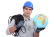 Electrician holding globe