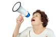 Photo: Elderly woman shouts something into a megaphone Elderly woman shouts something into a megaphone