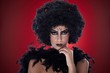 Young woman dressed like devil