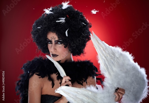 Photo: Evil woman with angel wings Evil woman with angel wings