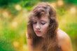 Photo: Shy teenage girl alone outside in nature Shy teenage girl alone outside in nature