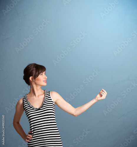 Photo: Pretty lady gesturing with copy space Pretty lady gesturing with copy space