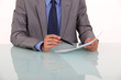Close-up of man proof reading a document