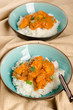 Indian dish - Chicken tikka masala served with rice and garnishe