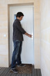 Man opening door