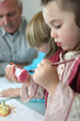 Little boy and  girl painting