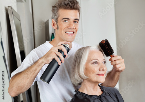 Photo: Hairstylist Setting Up Customer's Hair Hairstylist Setting Up Customer's Hair