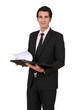 Businessman reading notes from meeting