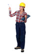 craftswoman holding a notepad and a pen