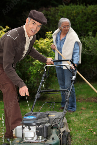 Photo: Senior couple gardening. Senior couple gardening.