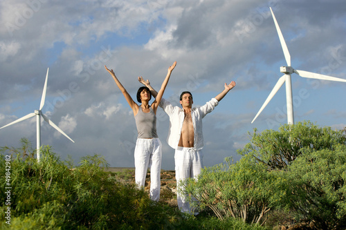 Photo: Zen couple on a wind farm Zen couple on a wind farm