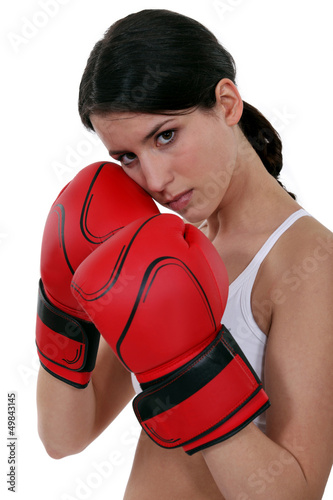 Photo: woman wearing red box gloves woman wearing red box gloves