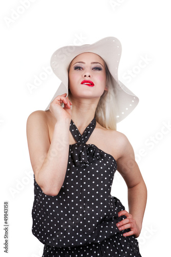 Photo: Attractive woman with hat and red lipstick biting her lips Attractive woman with hat and red lipstick biting her lips