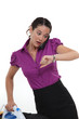 A working woman frantically looking at the time