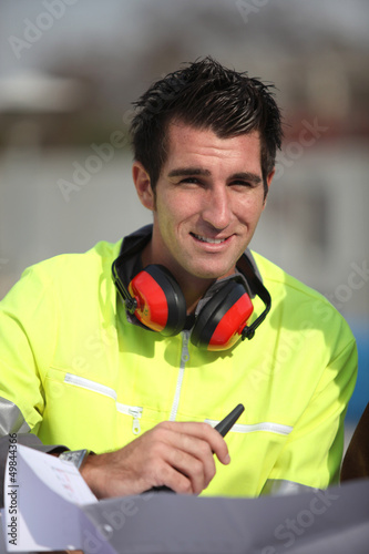 Photo: Foreman in safety gear on site Foreman in safety gear on site