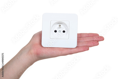 Photo: Woman with electrcial plug Woman with electrcial plug
