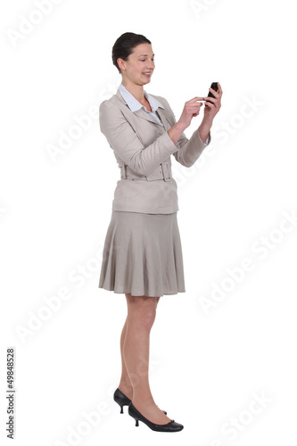 Photo: Woman with mobile phone Woman with mobile phone