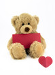 Photo: Teddy bear with red blank card and heart. Teddy bear with red blank card and heart.