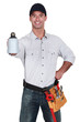 Tradesman holding a blowtorch