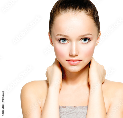 Photo: Portrait of Beautiful Young Woman with Fresh Clean Skin Portrait of Beautiful Young Woman with Fresh Clean Skin