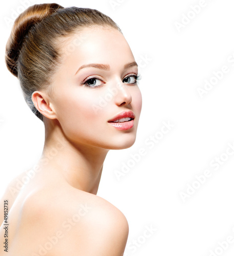 Photo: Beauty Teenage Girl Portrait isolated on a White Background Beauty Teenage Girl Portrait isolated on a White Background