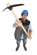 Man wielding pick-axe