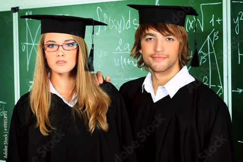 Photo: students in gowns students in gowns