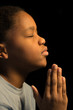 Praying African Americn boy