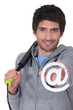 Man in gymwear with an @ sign