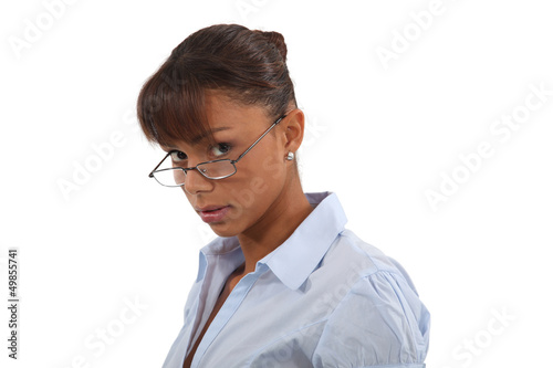 Photo: Brunette posing in glasses Brunette posing in glasses