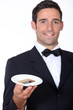 Waiter with a customer's credit card